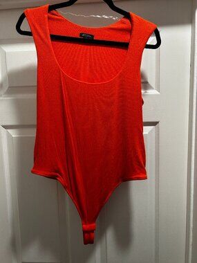 Orange Ribbed Bodysuit